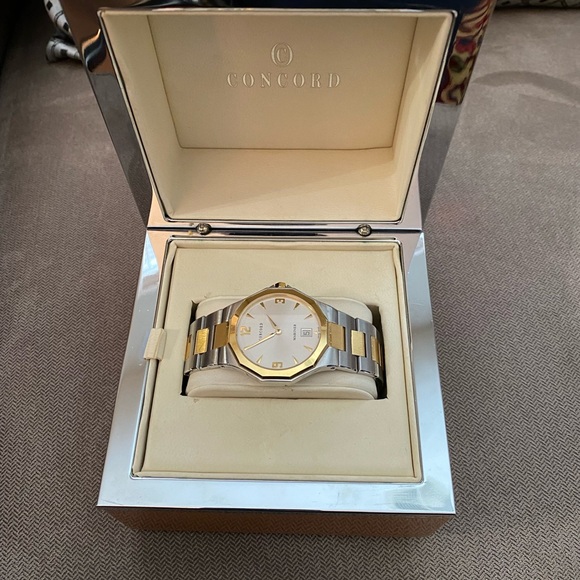 Men\'s 18 karat gold, and stainless steel Concorde wristwatch original box papers